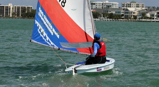 Beginner sailor learning Sunfish upwind sailing technique.